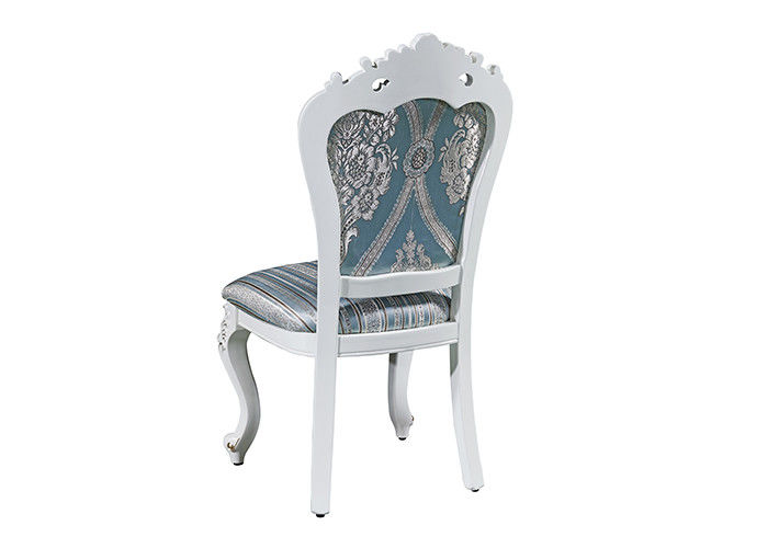 De Eetkamerstoelen van het familieluxe Gesneden Houten Restaurant